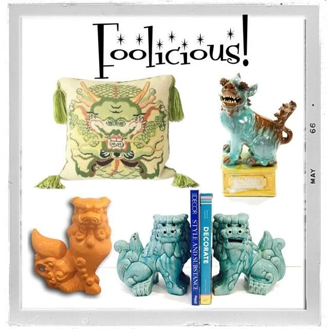 A decorative framed poster featuring Asian-inspired lion and dragon statues, a plush pillow with a dragon design, and a small colorful figurine of a mythical creature, all with the word 'Foolicious!'