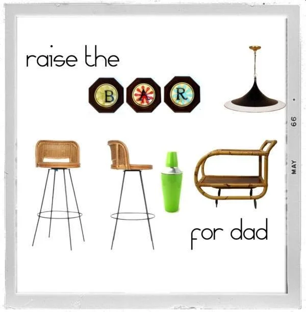 Decorative wall art with the text 'raise the B R for dad' and various home decor items including chairs, a table lamp, a green lamp, and a hanging light fixture.