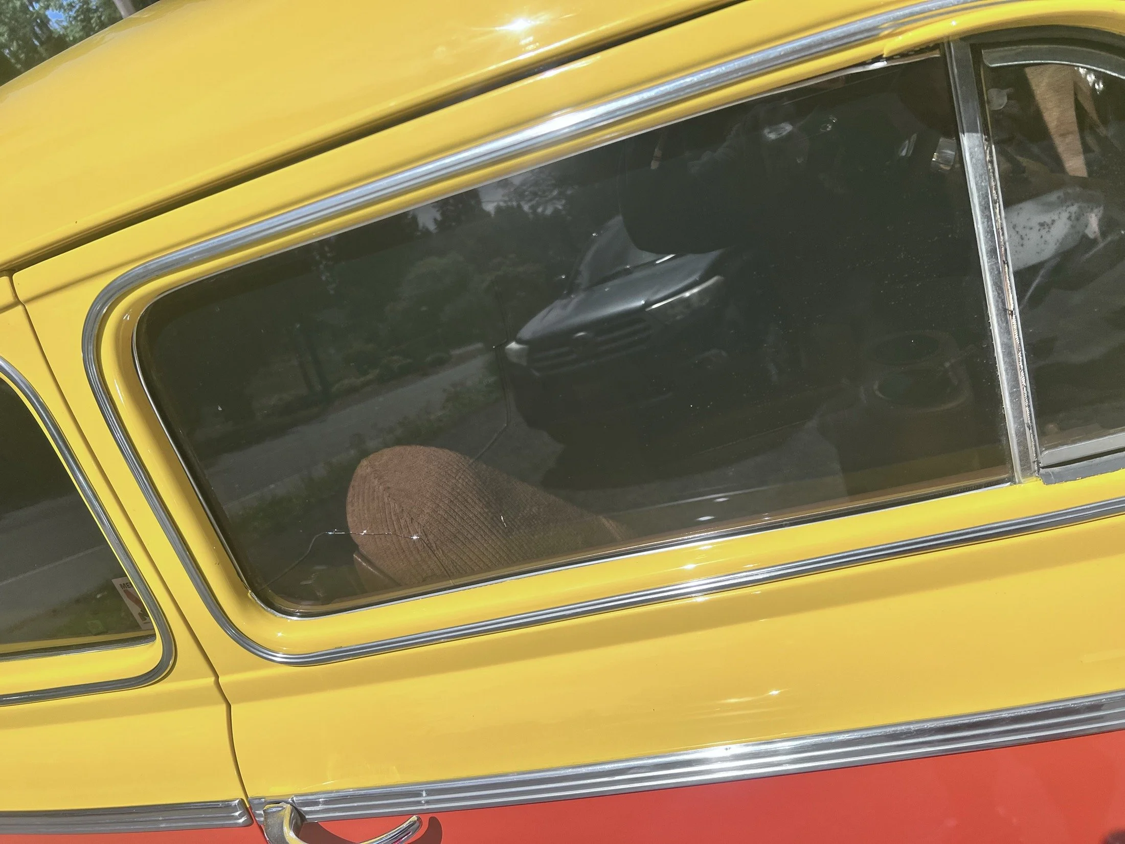 Completion detail — Vent-window glass seated and fitment verified.