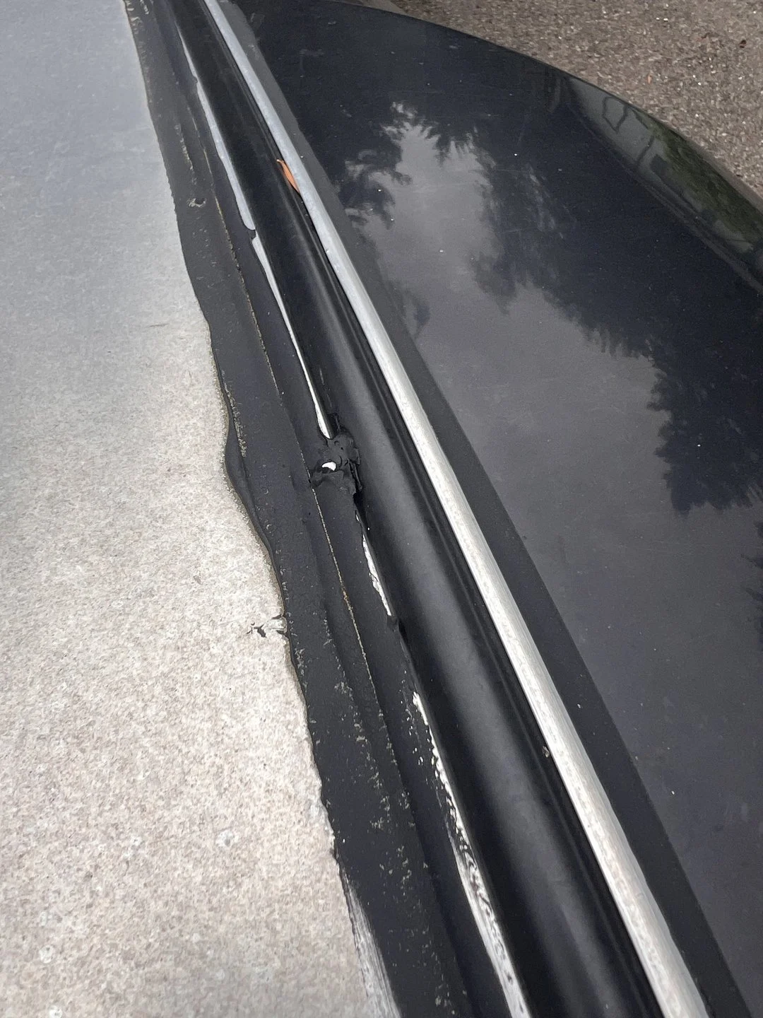 Classic glass and weatherstrip — New weatherstrip fitted around the glass opening.