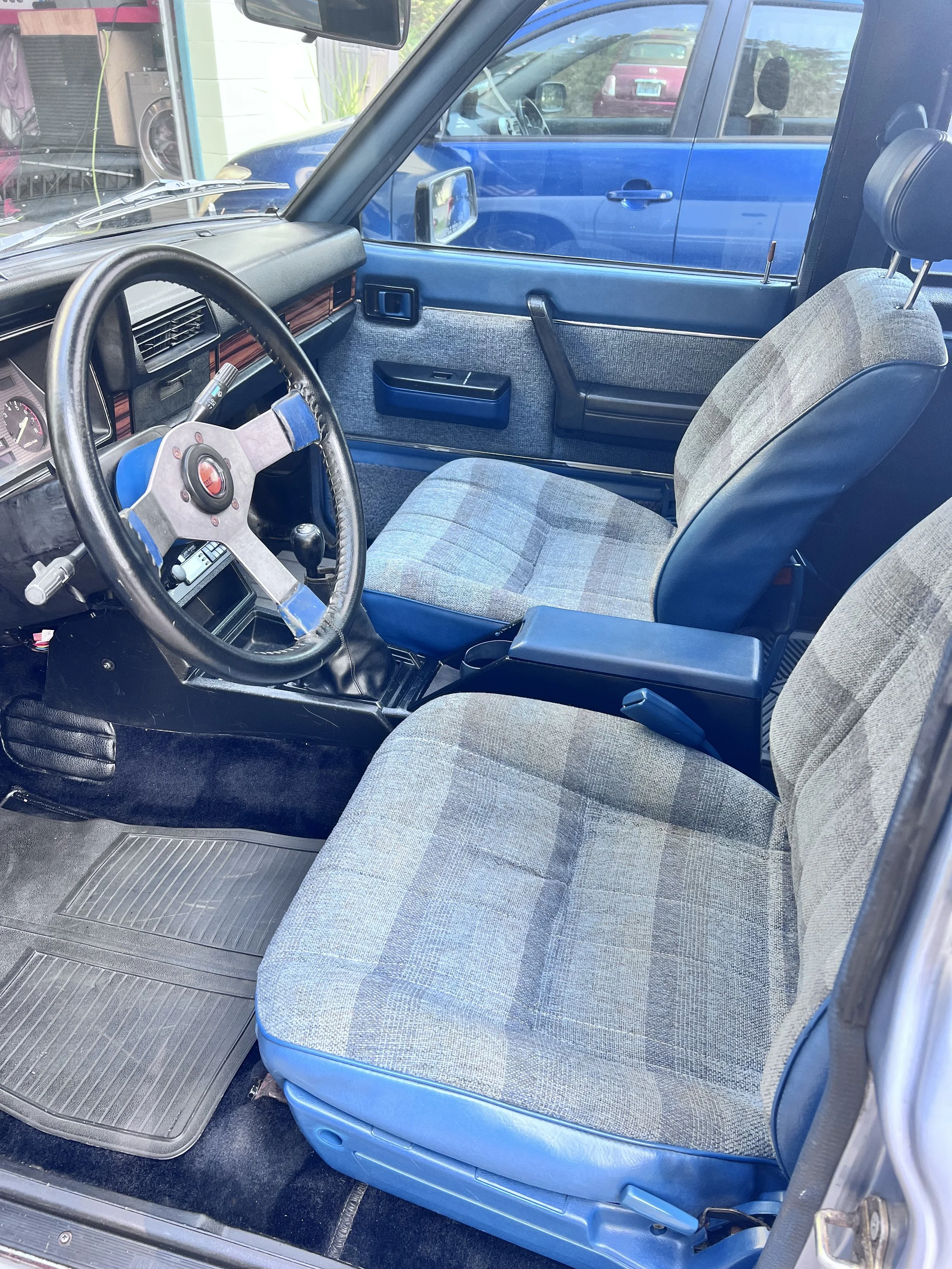 Cabin overview — Classic Nissan interior documented after professional cleaning and presentation work.