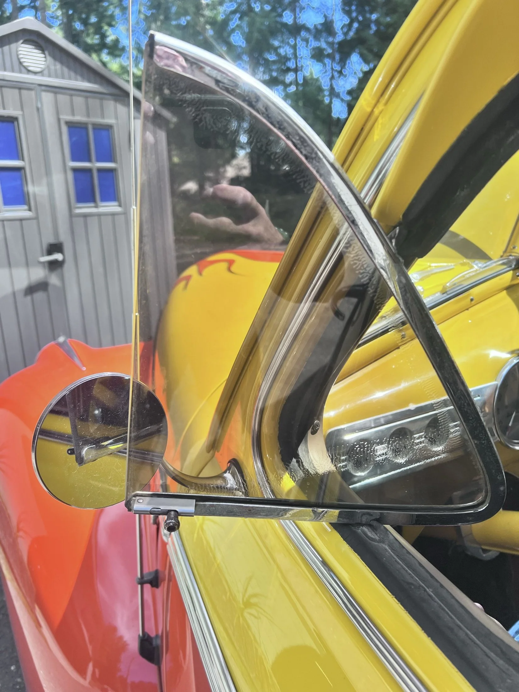 Inspection — 1940s custom sedan vent-window glass and weatherstrip condition.