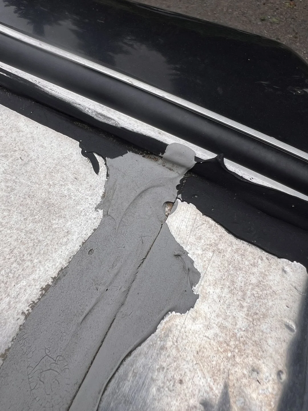 Classic glass and weatherstrip — Finished seal alignment and glass-edge fitment documented.
