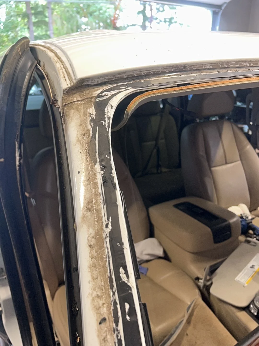 Windshield service — Old urethane and perimeter condition documented after glass removal.