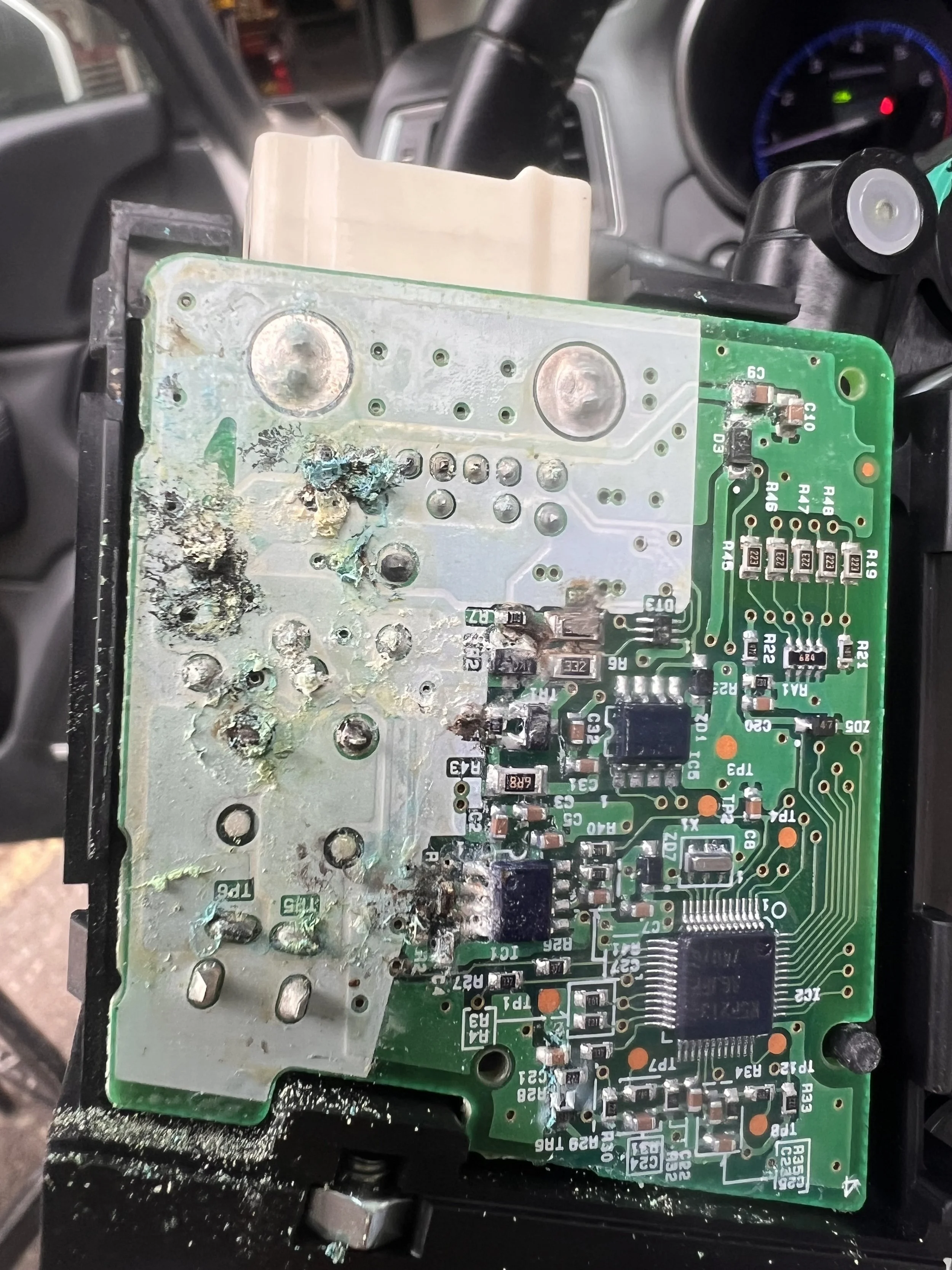 Hidden damage — Corrosion on the overhead control module caused by repeated moisture exposure.