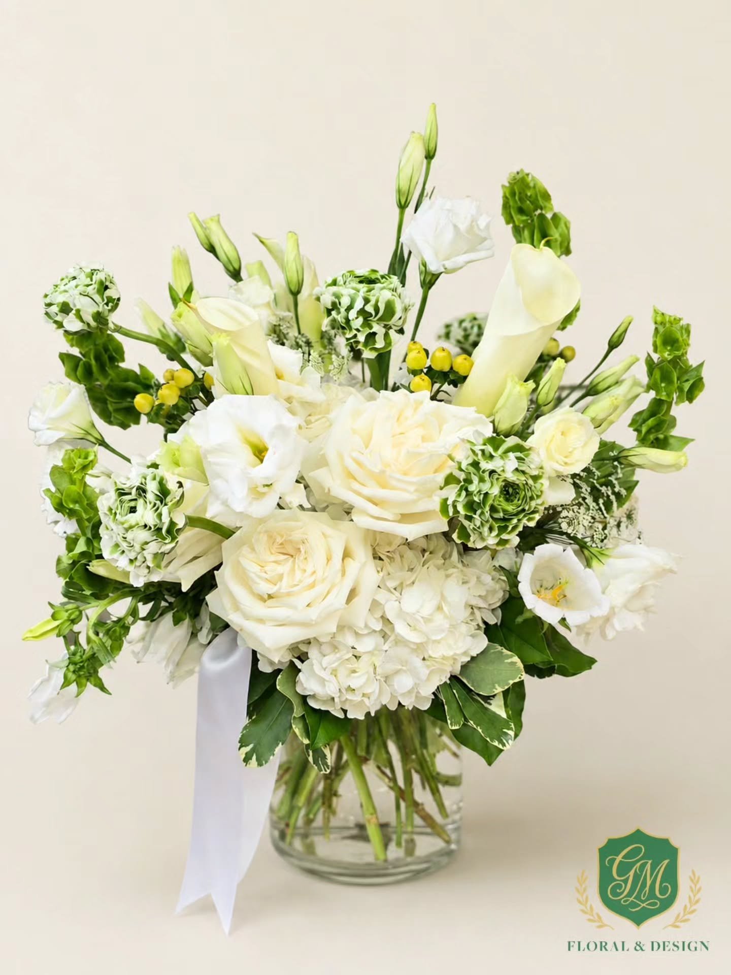 Classic white and green never misses!! No matter the occasion.

This one is a stunner, designed with garden roses, hydrangeas, lisianthus, bells of Ireland and just a touch of lime hypericum.

A beautiful reminder that flowers don&rsquo;t need an occ