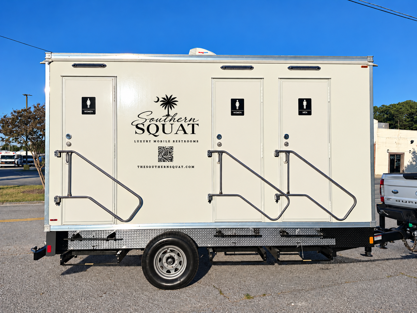 Southern Squat three-station luxury mobile restroom trailer with private entrances, available for weddings, corporate events, and private parties in Columbia, Lexington, Irmo, and surrounding South Carolina areas.