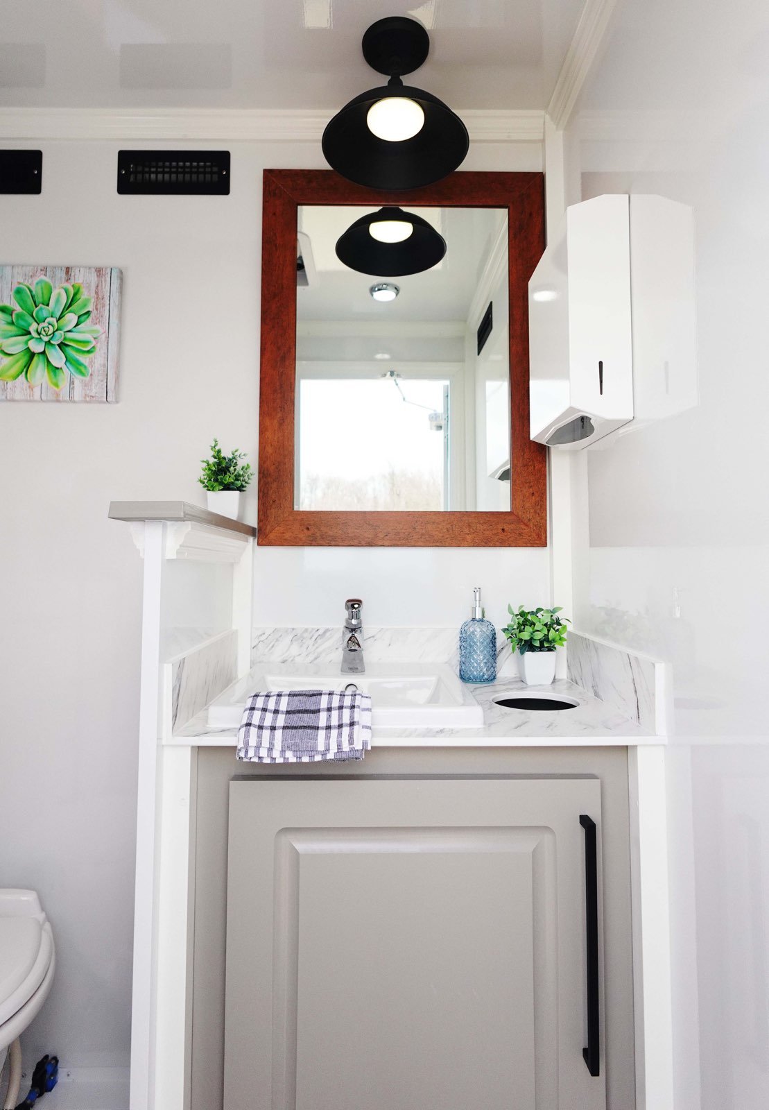 Luxury restroom trailer vanity and sink for South Carolina weddings