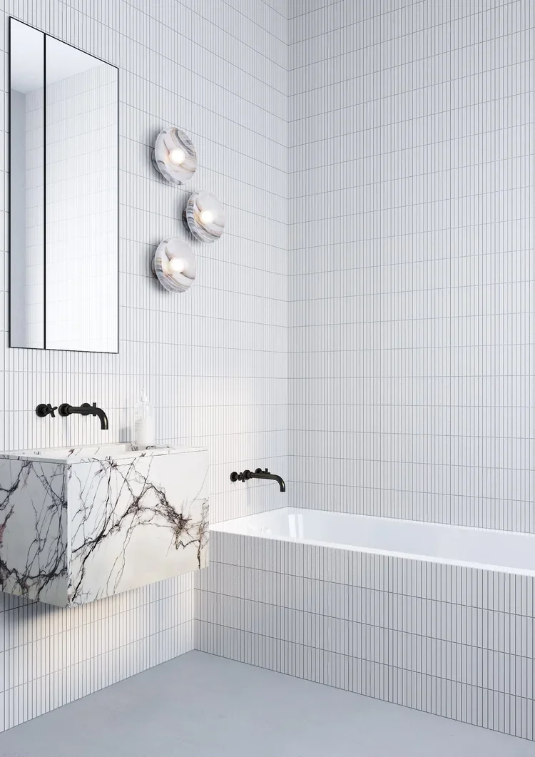 Marble bathroom vanity with black fixtures, Zurich interior design