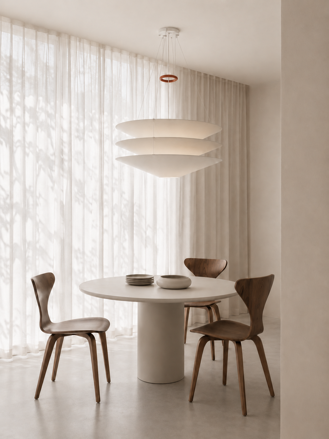Round dining table with wooden chairs