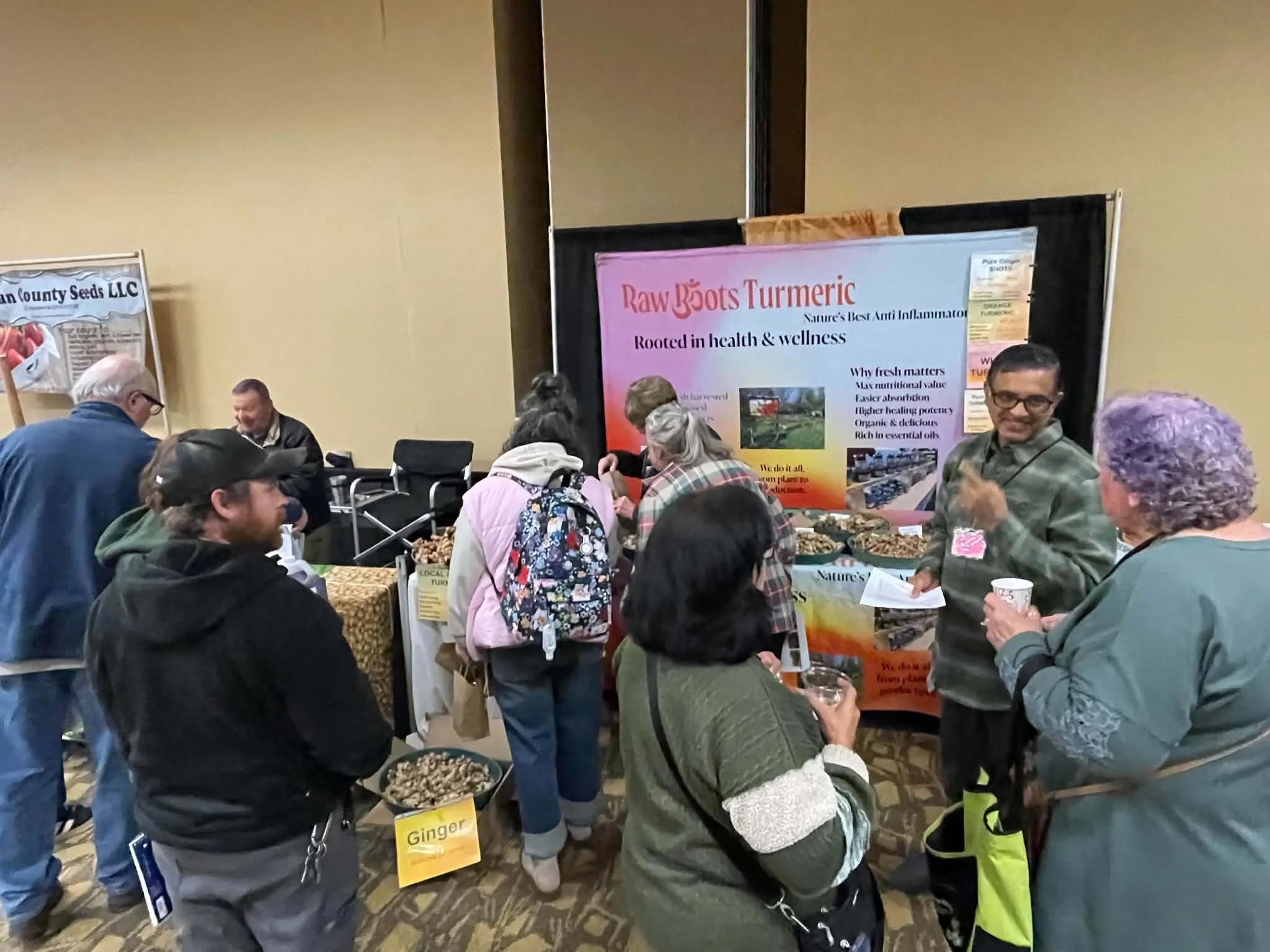 Attendees interact with vendors.