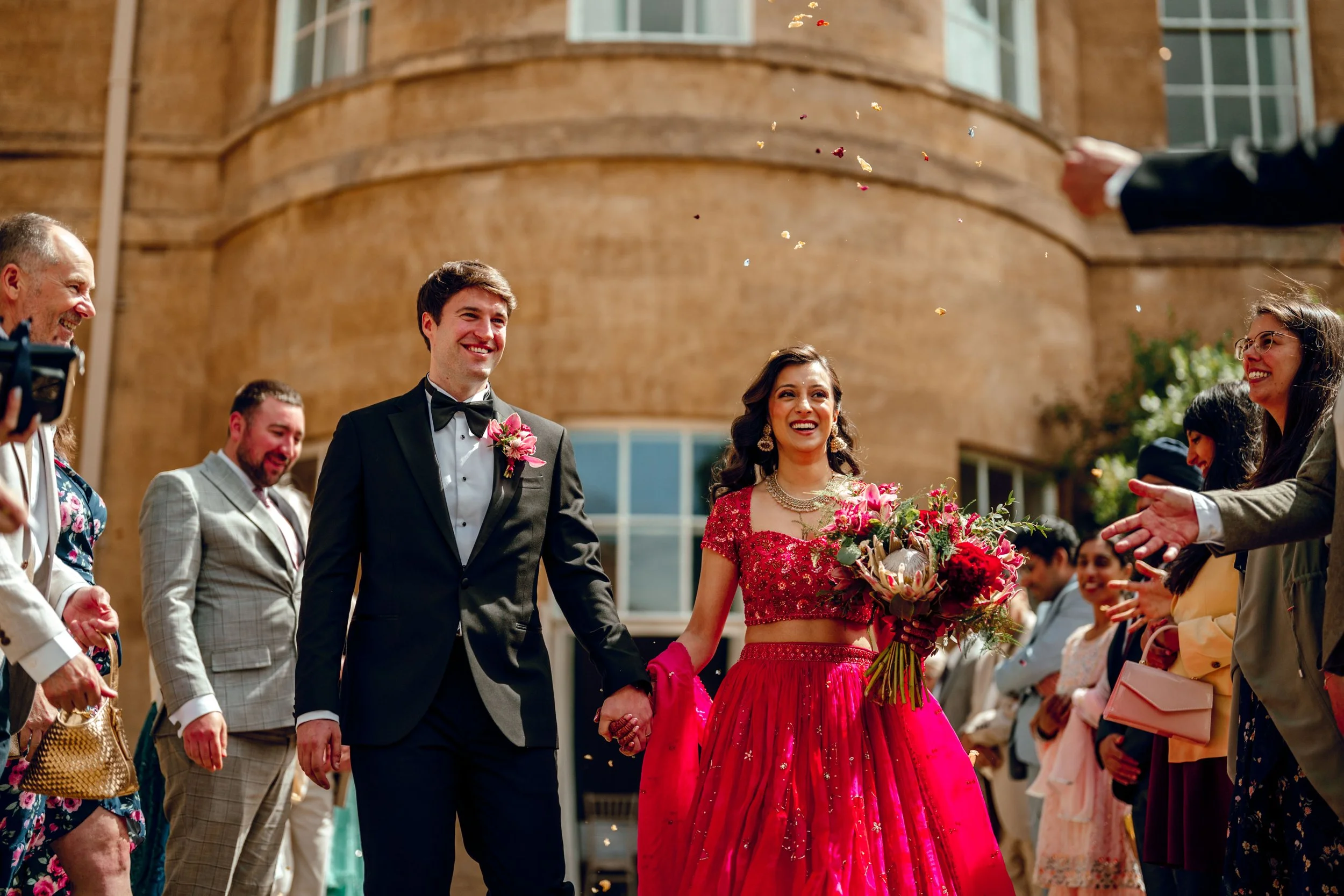 Pink and red wedding flowers at Rudding Park Harrogate. 