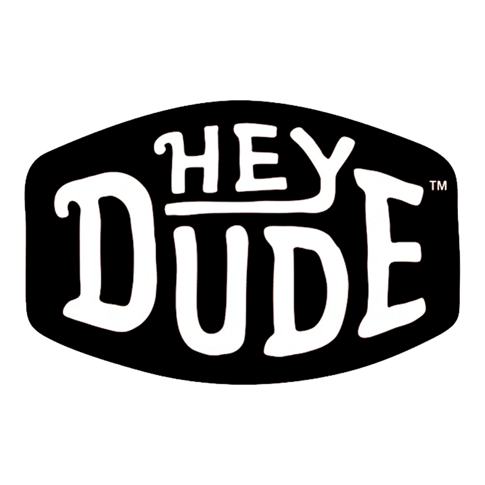 Black oval sign with bold white hand-drawn text that reads 'Hey Dude'.