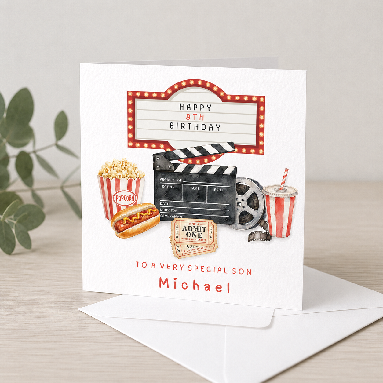 Birthday card with movie-themed graphics, including popcorn, hot dog, film reel, clapperboard, and soda, celebrating Michael's ninth birthday.