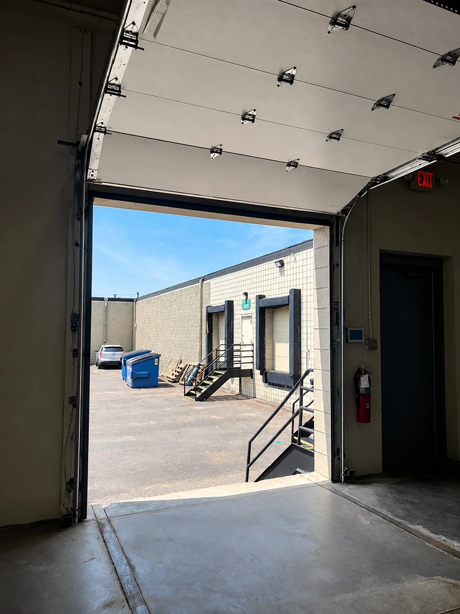 View from inside a building with an open loading dock.