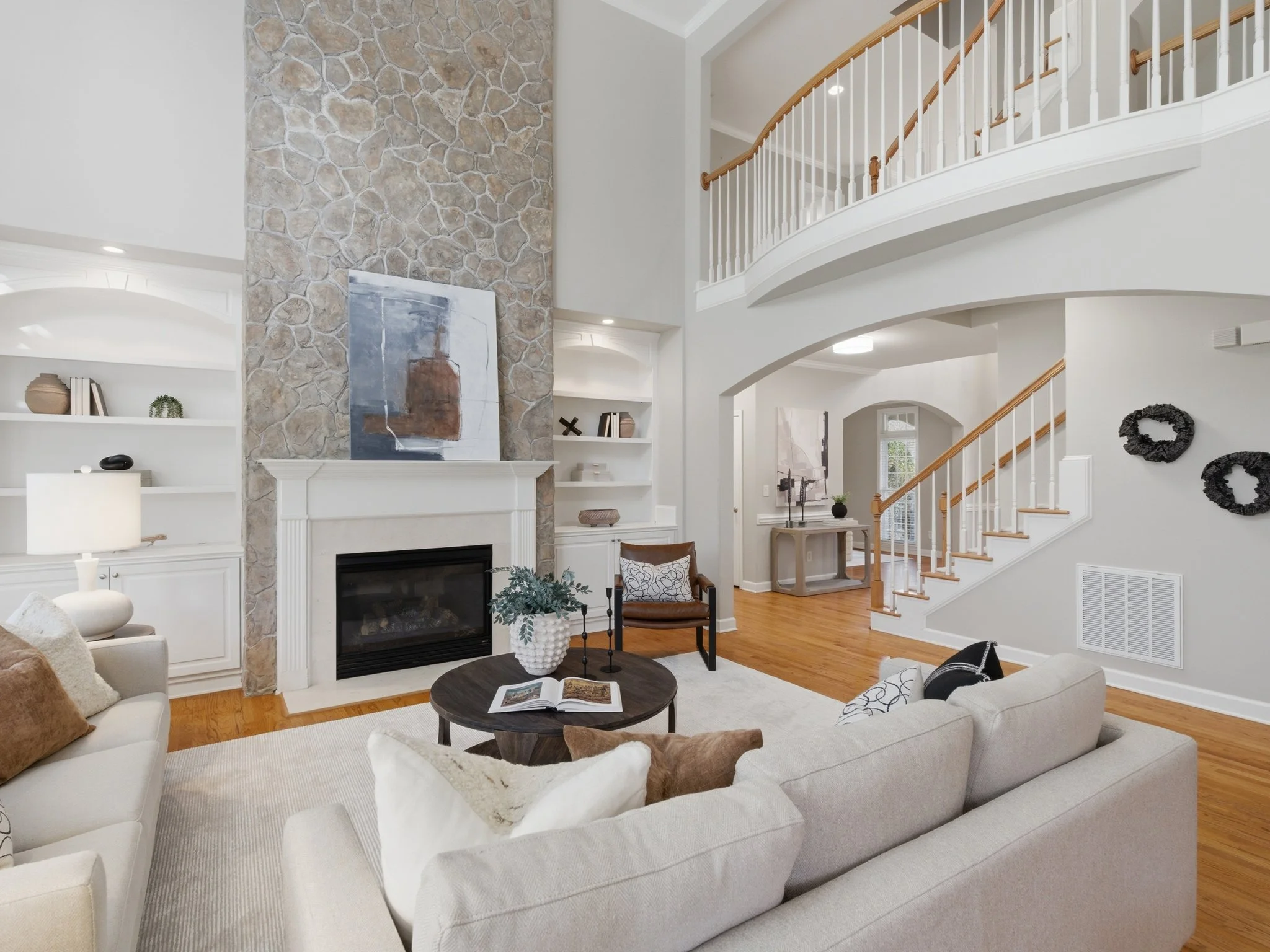 Staged living room with stone fireplace, Mecklenburg County NC