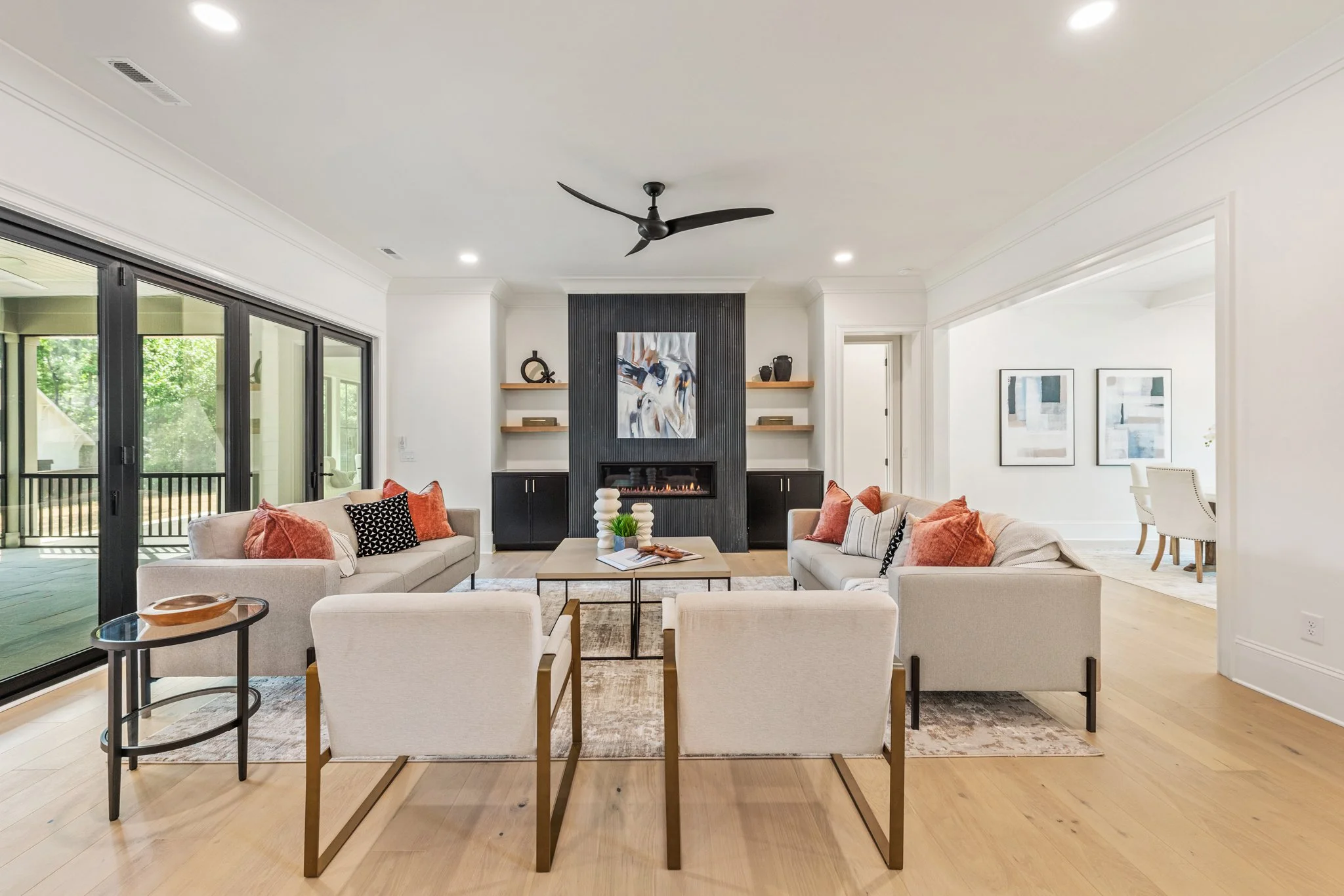 Staged living room with modern fireplace feature wall