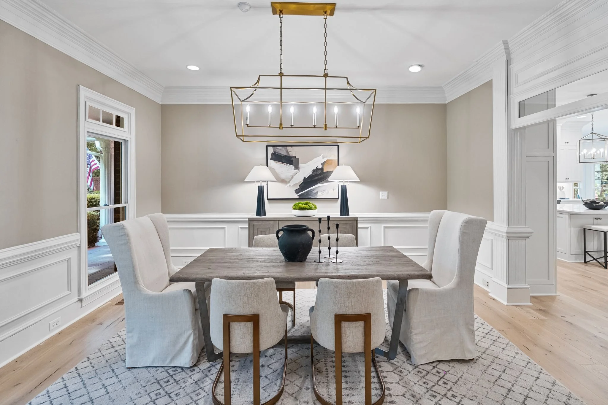 Staged dining room with brass lantern chandelier, Charlotte NC