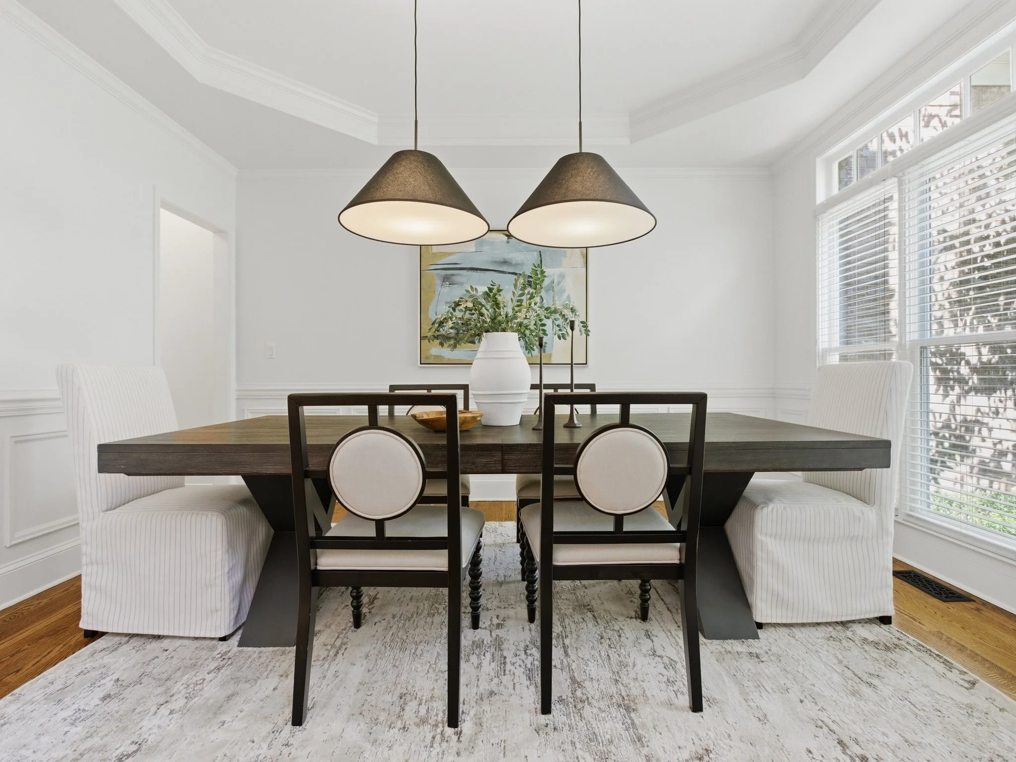 Staged dining room with dual pendant lights, Charlotte NC
