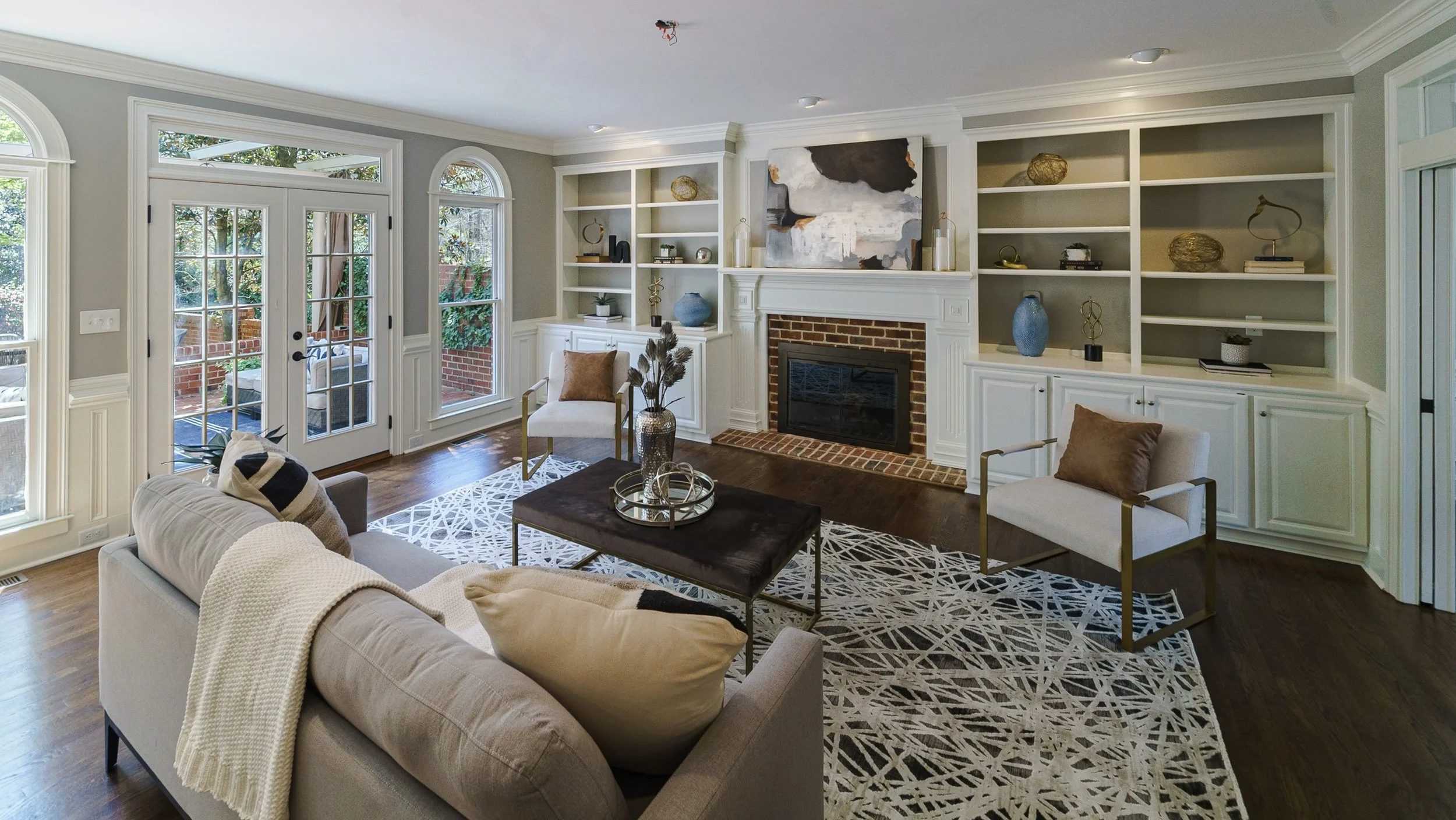 Staged living room with built-ins and French doors, Charlotte NC