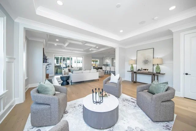Staged living room with coffered ceiling