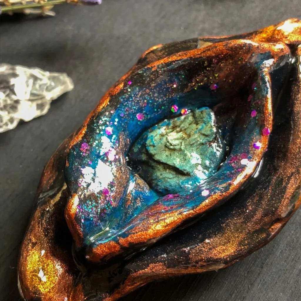 “Multicolored Yoni"   Clay sculpture, acrylic paint, serpentinite stone and glitter.