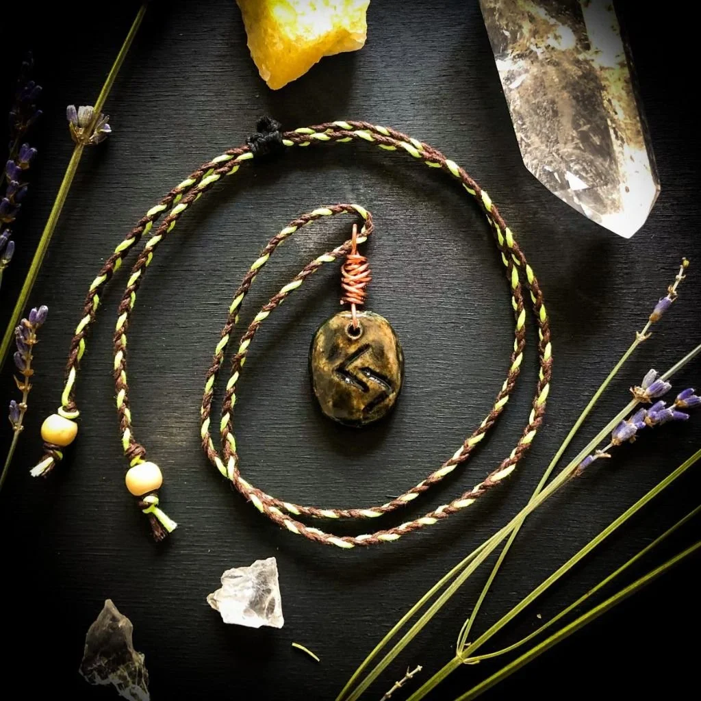 "The Jera Rune" - Talisman  
Clay and acrylic paint.