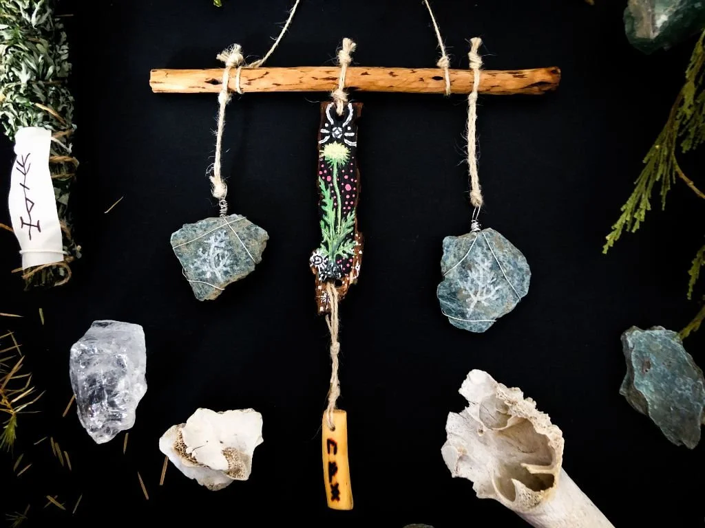 “Plant Shamanic Ally: Dandelion"  
Acrylic painting on bark, serpentinite stones, metal wire, wild ‑ gathered wood, and rope.
