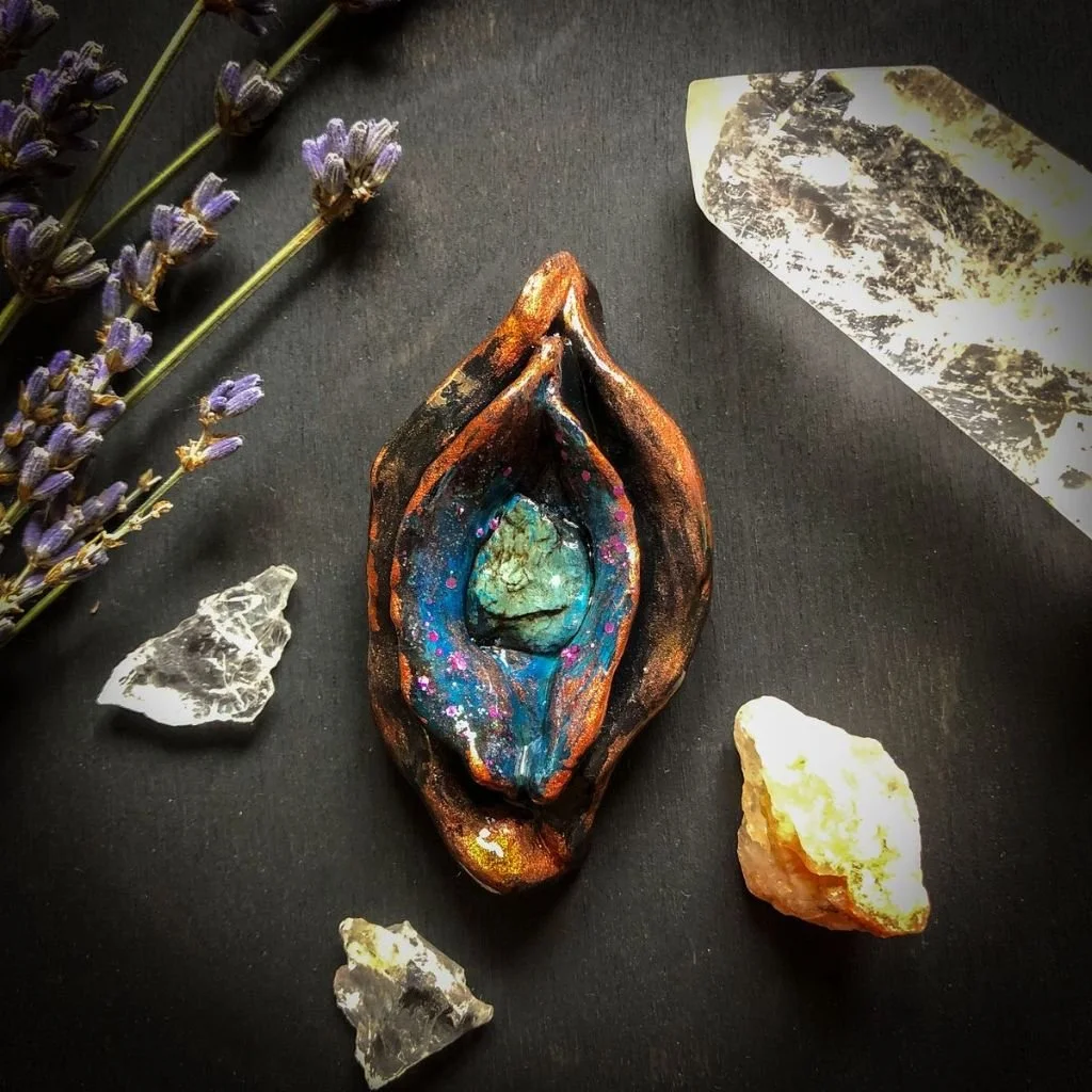 “Multicolored Yoni"   Clay sculpture, acrylic paint, serpentinite stone and glitter.