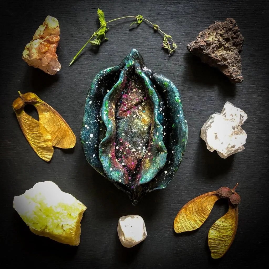 "Galaxy Yoni"  
Clay sculpture, acrylic paint, serpentinite stone and glitter.