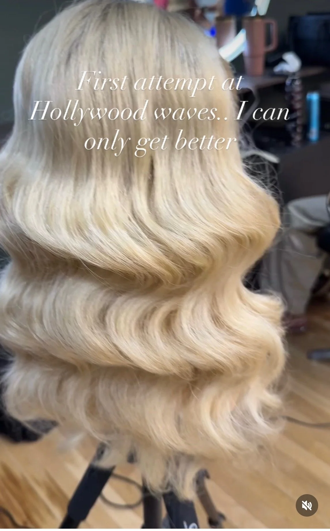 Blonde hair styled in loose waves, side view, with overlay text that reads 'First attempt at Hollywood waves.. I can only get better'.