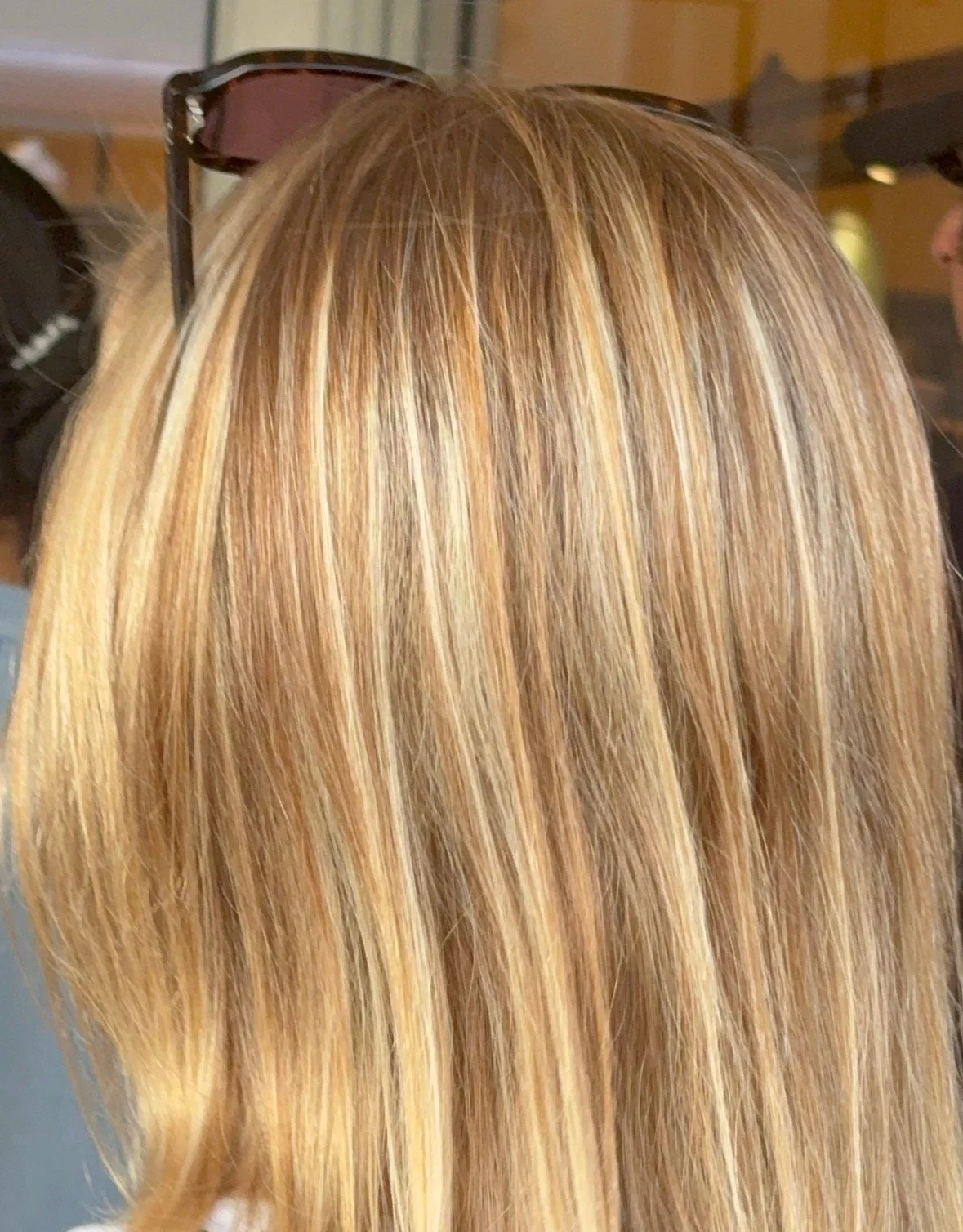 Close-up of blonde hair with highlights.