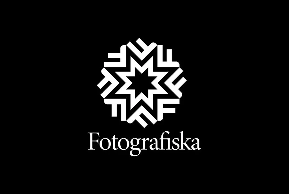 A black background with a white geometric logo above the word 'Fotografiska' in white text.