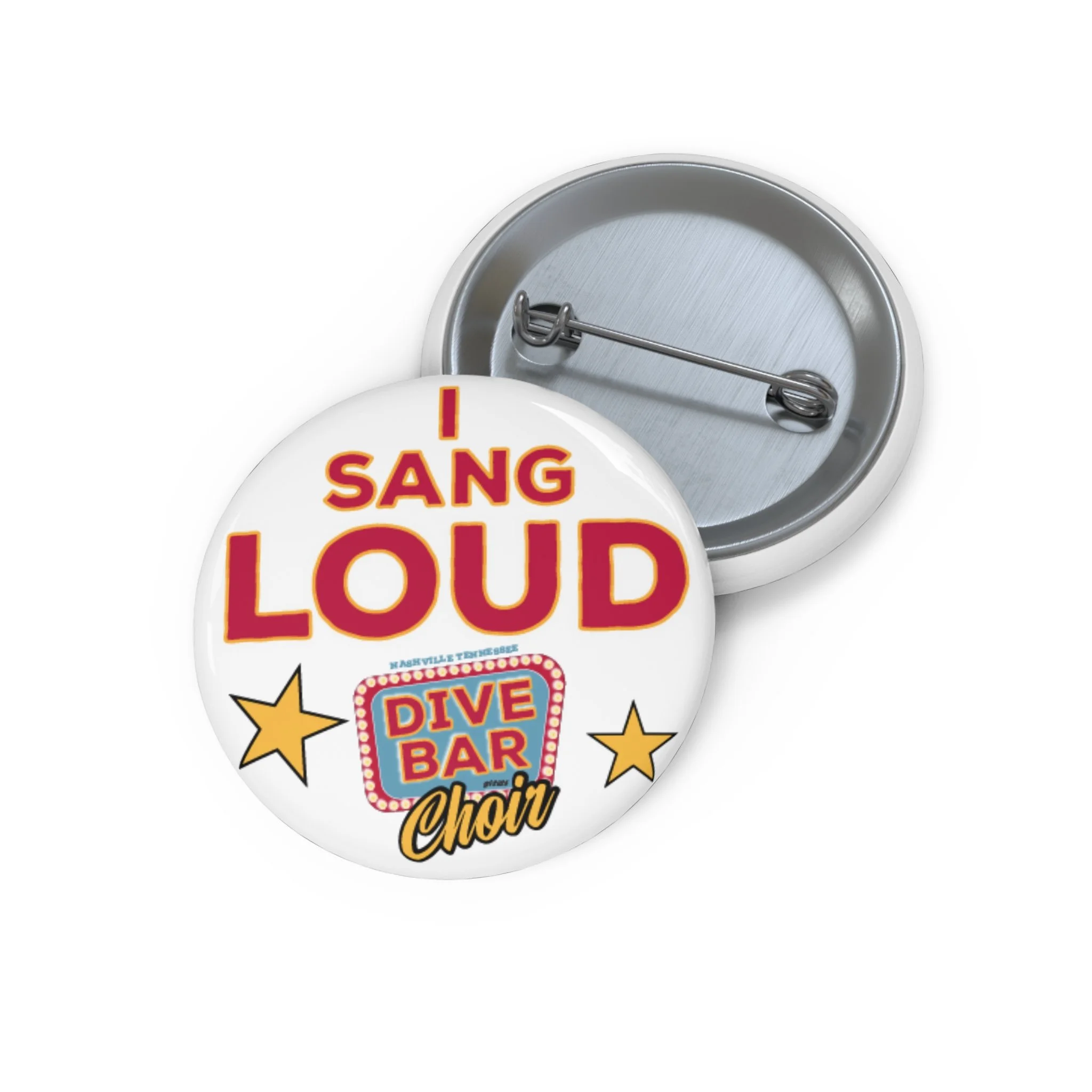 Vintage style badge with 'I Sang Loud' in colorful letters, surrounded by stars, with a pin at the back for attachment.