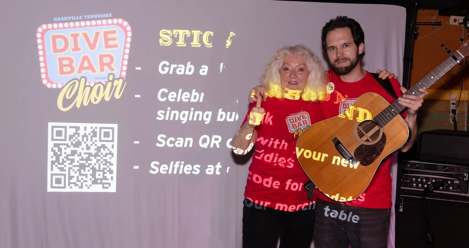 Zelda and Dave on stage after our Dive Bar Choir Launch Party,