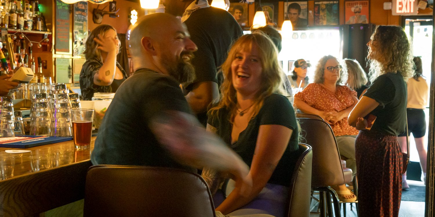 People socializing at our Dive Bar Choir Launch Party,