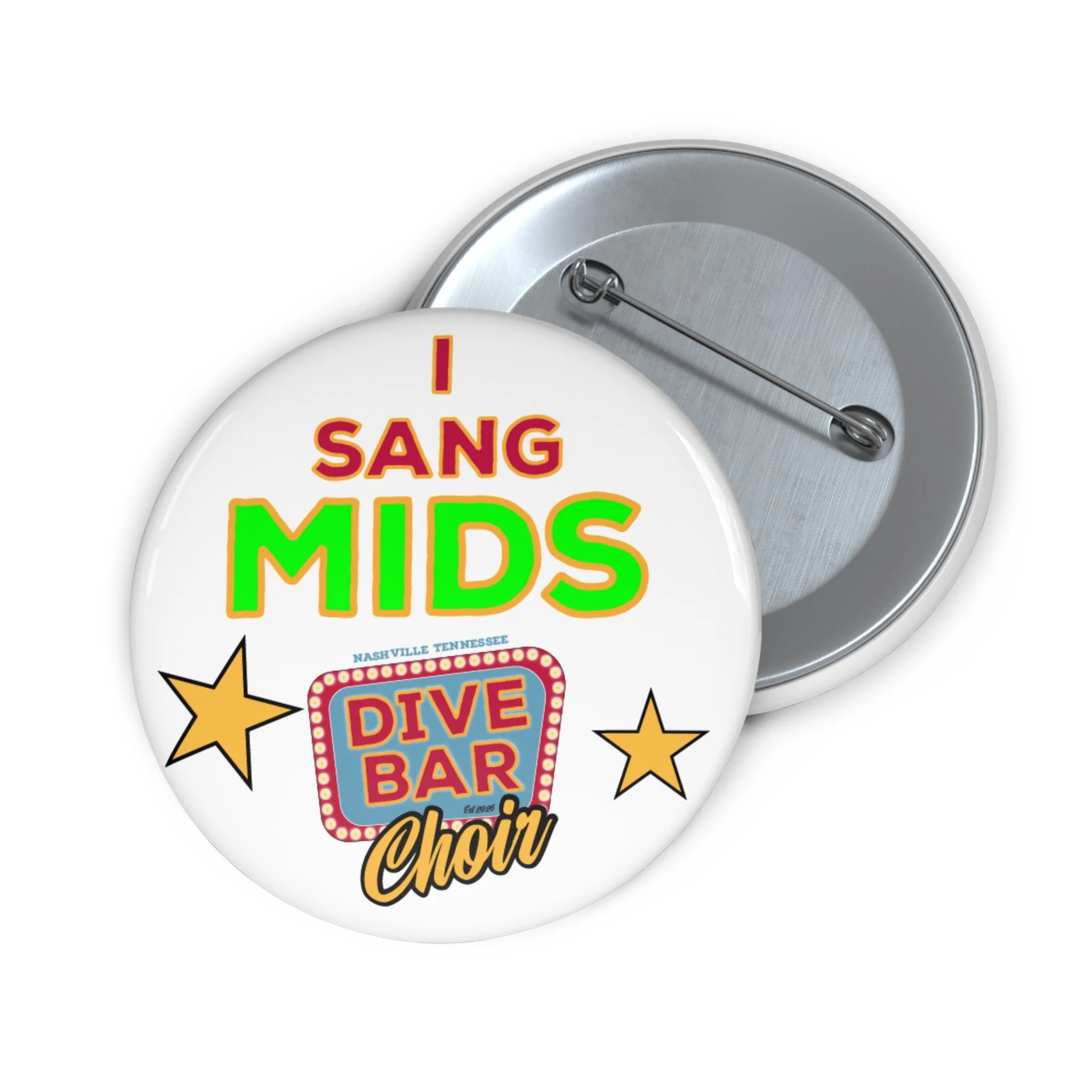 Vintage style badge with 'I Sang Mids' in colorful letters, surrounded by stars, with a pin at the back for attachment.