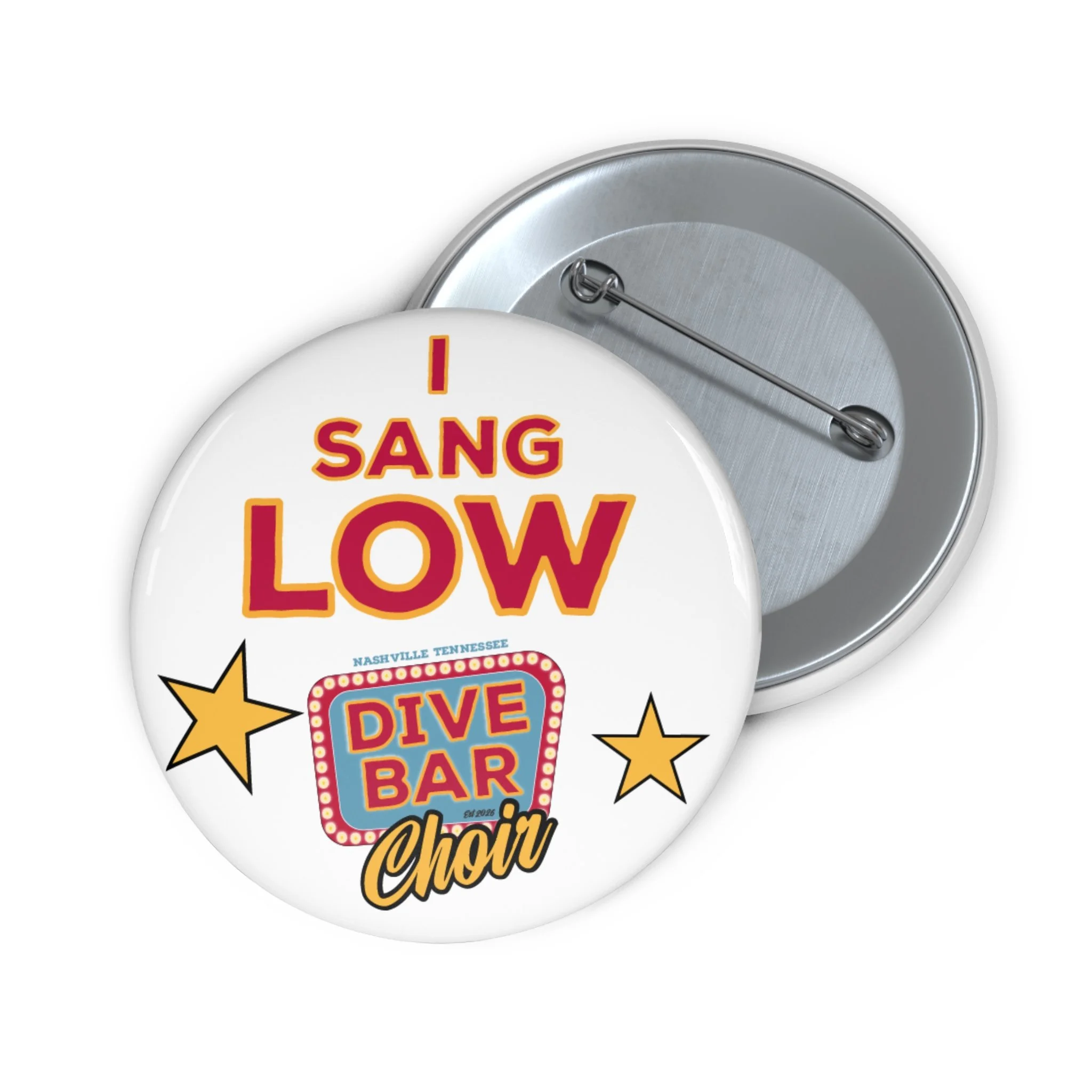 Vintage style badge with 'I Sang Low' in colorful letters, surrounded by stars, with a pin at the back for attachment.