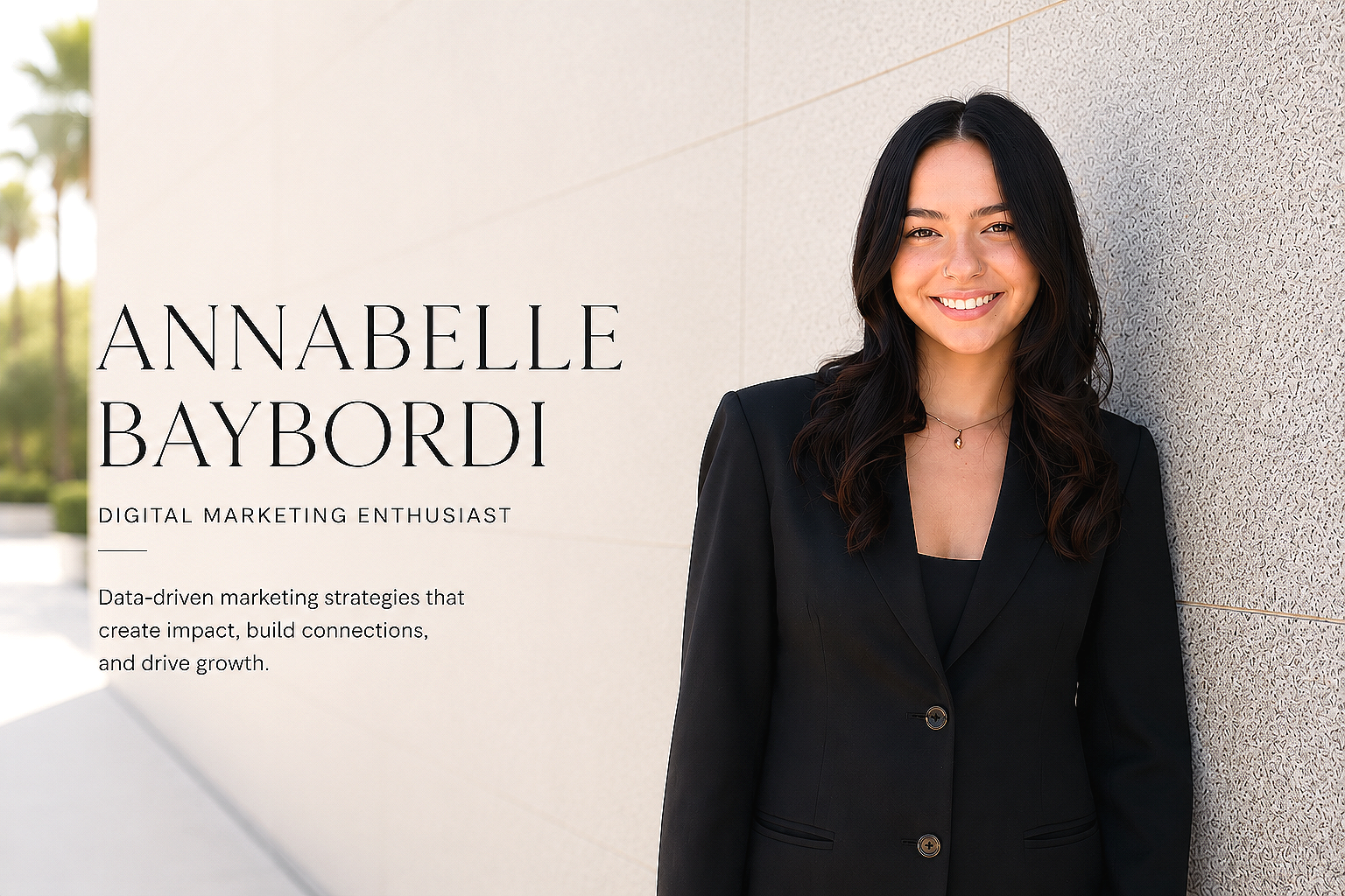 Woman in black blazer smiling and leaning against a textured wall with her name and title on the left side of the image.