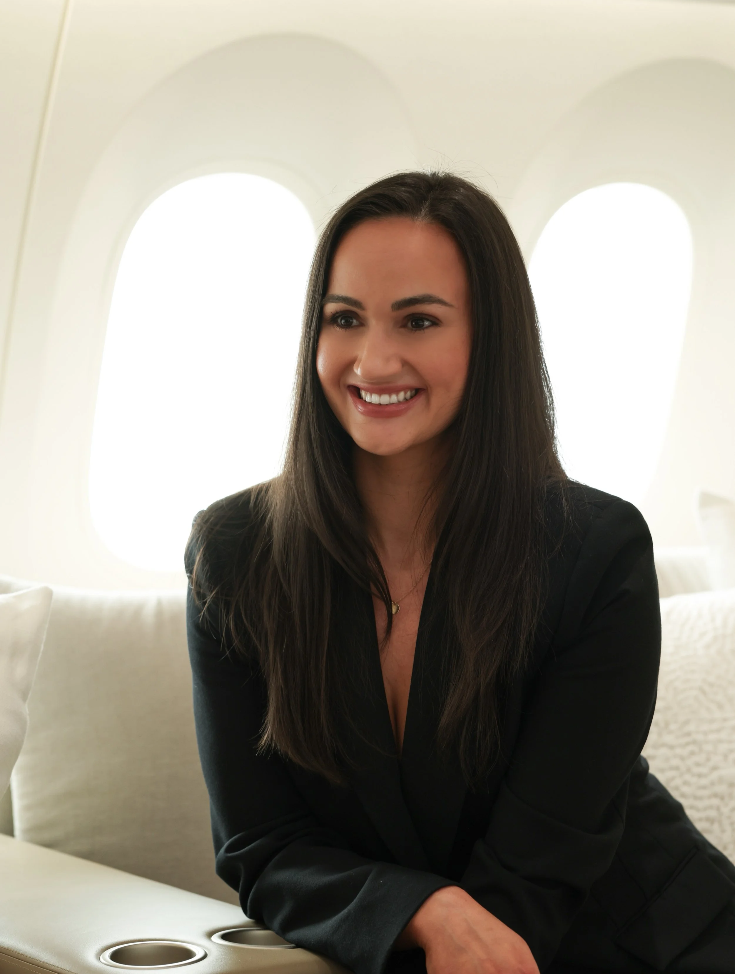 MCCAHL founder seated in a private aircraft interior