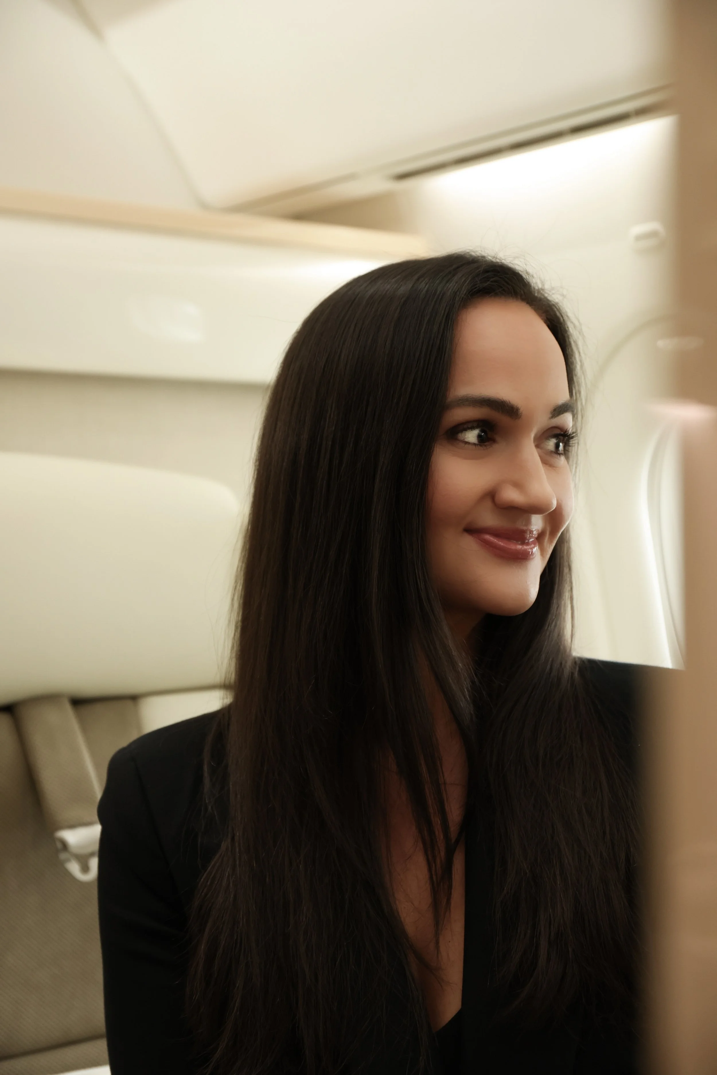 MCCAHL founder seated in a private aircraft interior