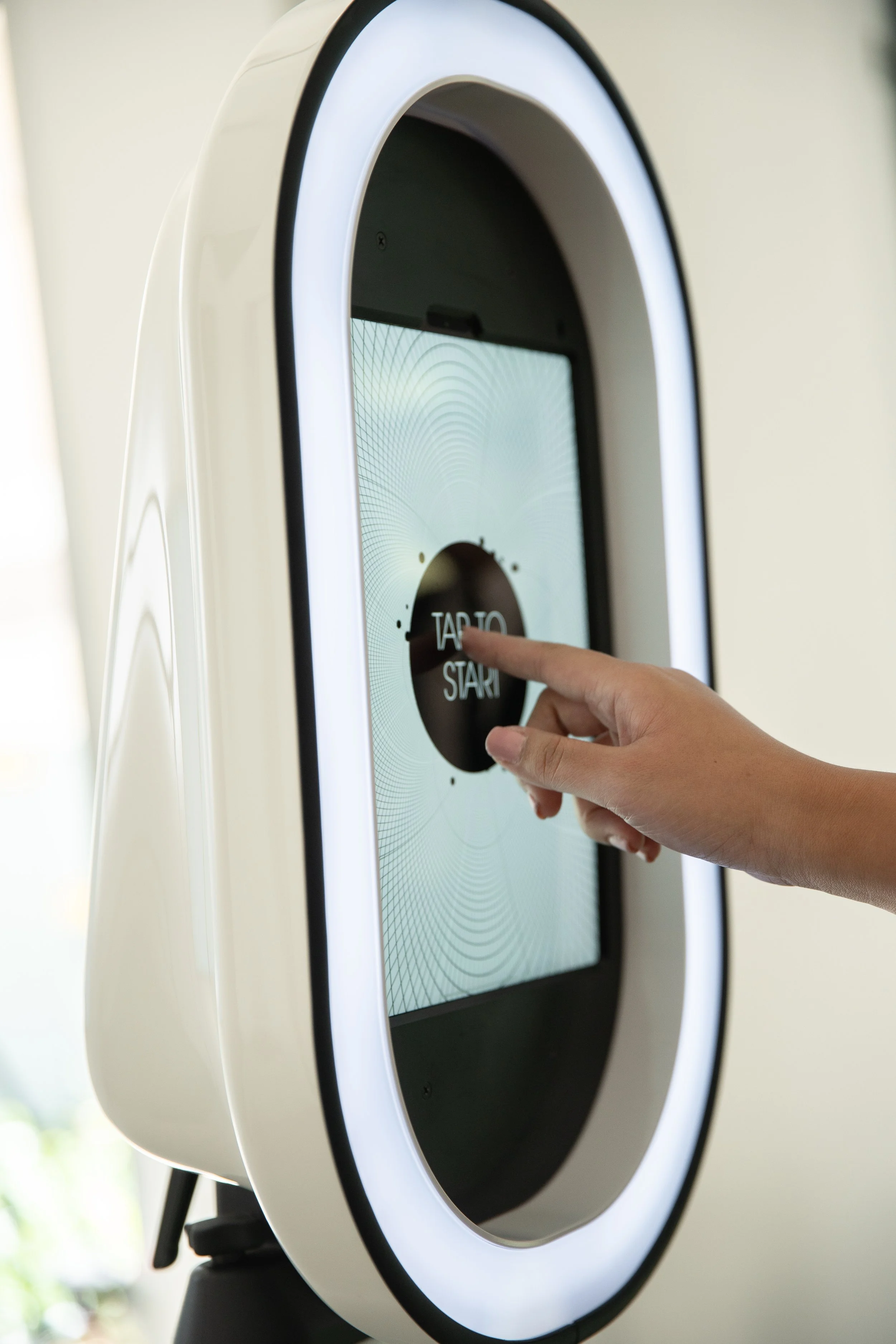 Guest interacting with the Modern Booth touchscreen at a Savannah wedding, featuring a sleek design, custom welcome screen, and instant digital photo booth experience