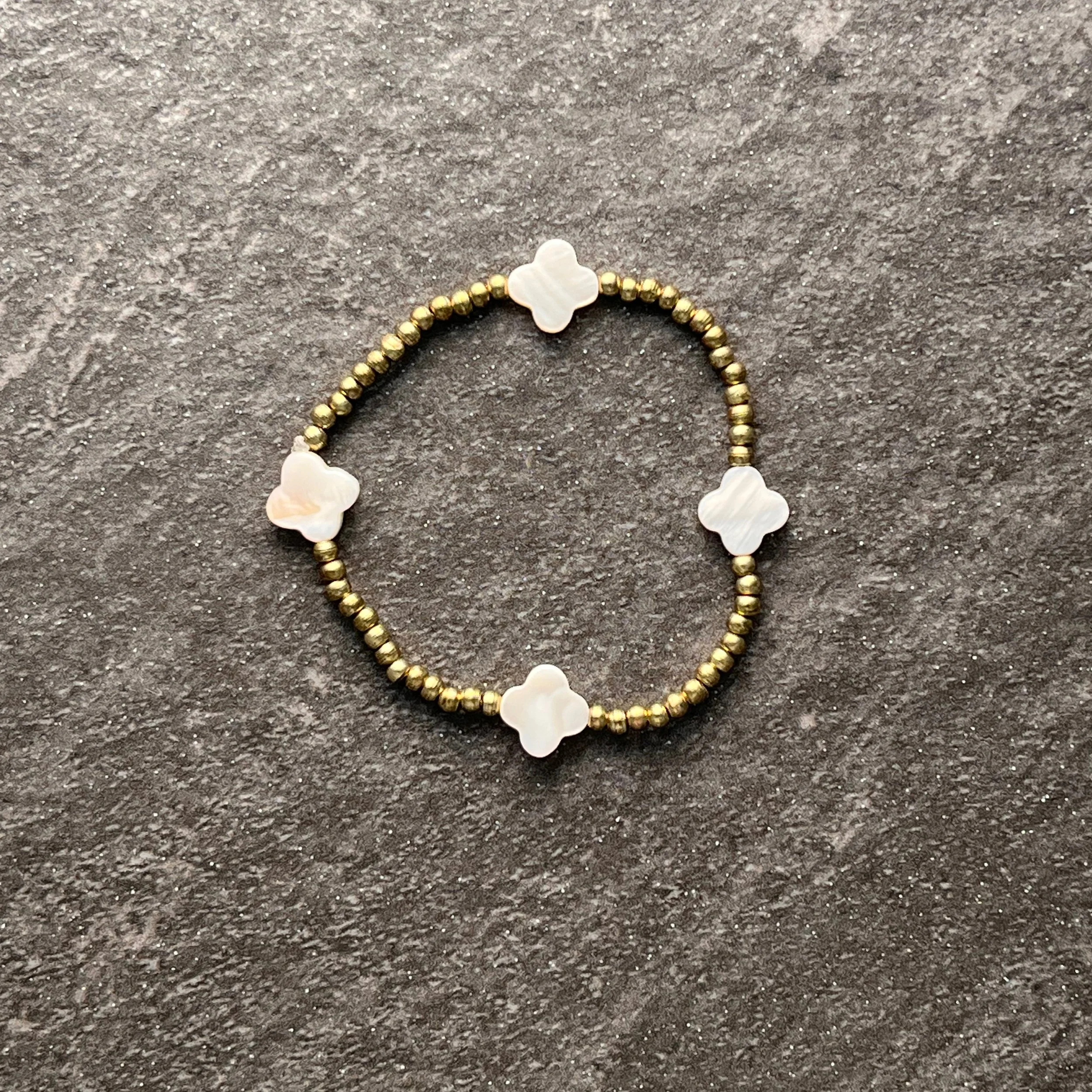 White Clover: Gold seed beads paired with delicate shell clovers for a soft feminine touch. 

$20 