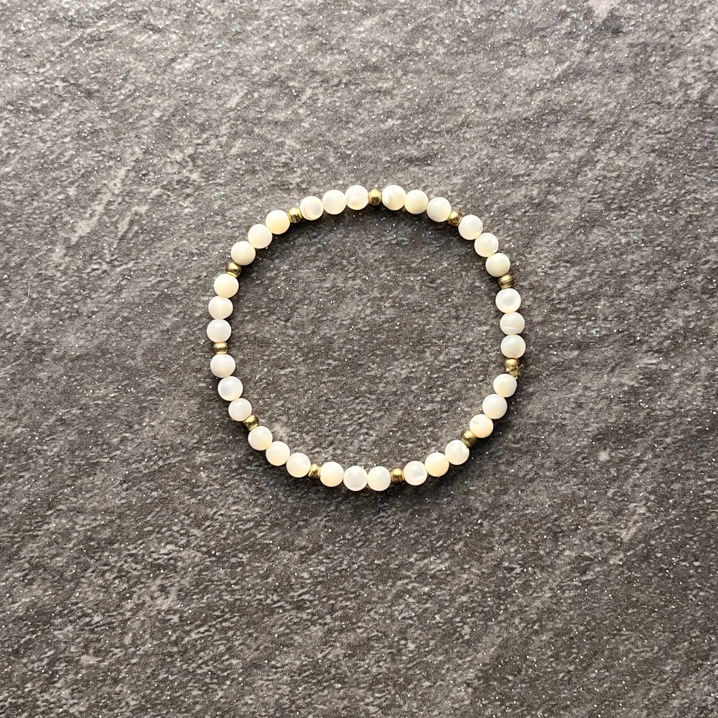 Modern Pearl: Mother of pearl beads are paired with warm gold accents for a fresh take on a timeless classic. 

$20