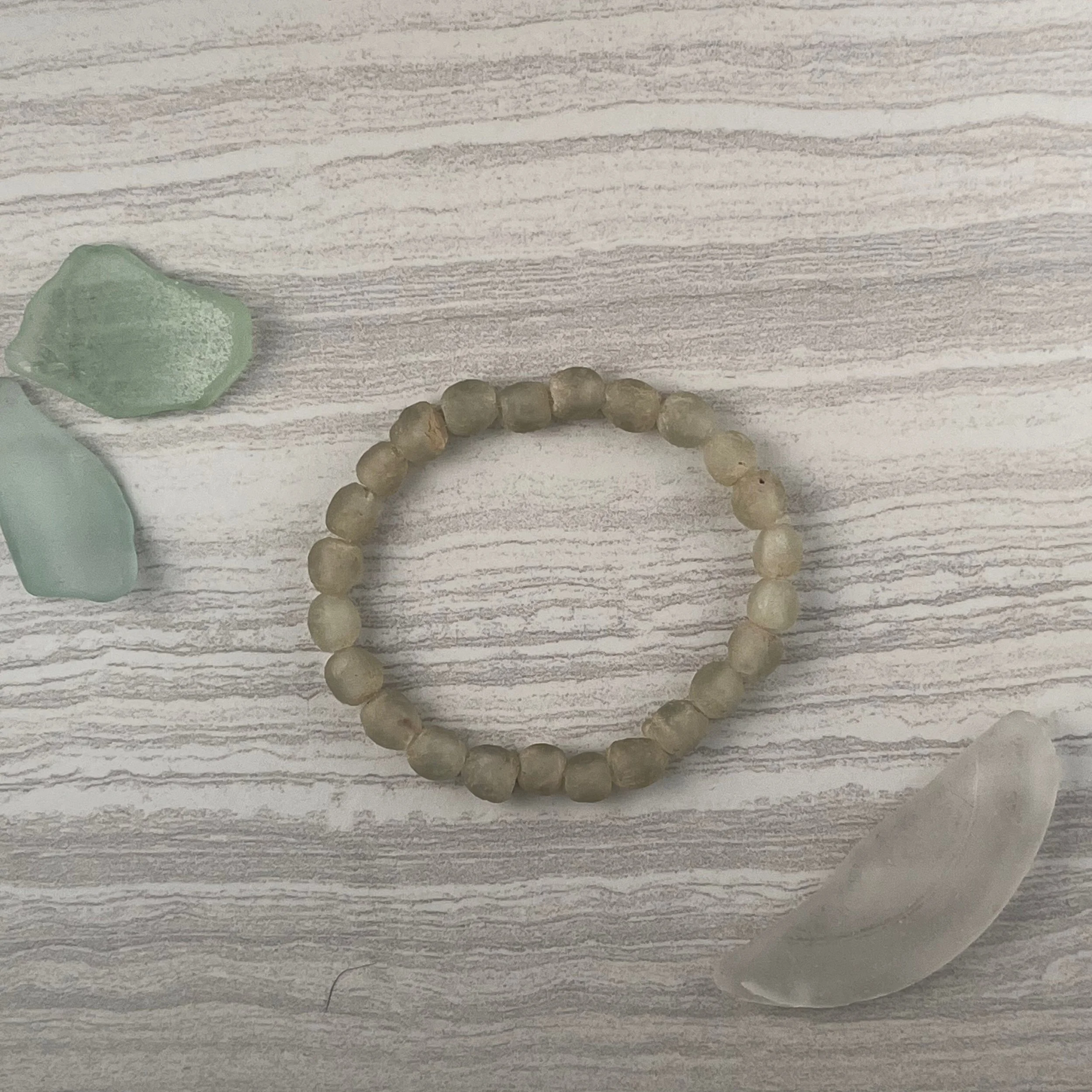 Sea Salt: Handcrafted with recycled clear glass beads, each one softly frosted and uniquely shaped, giving each bracelet it's own character. 
$20 