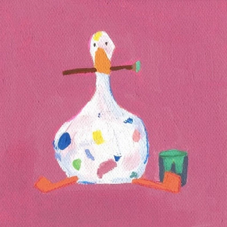 Child's drawing of a colorful duck with a paintbrush in its beak, sitting next to a green container, against a pink background.
