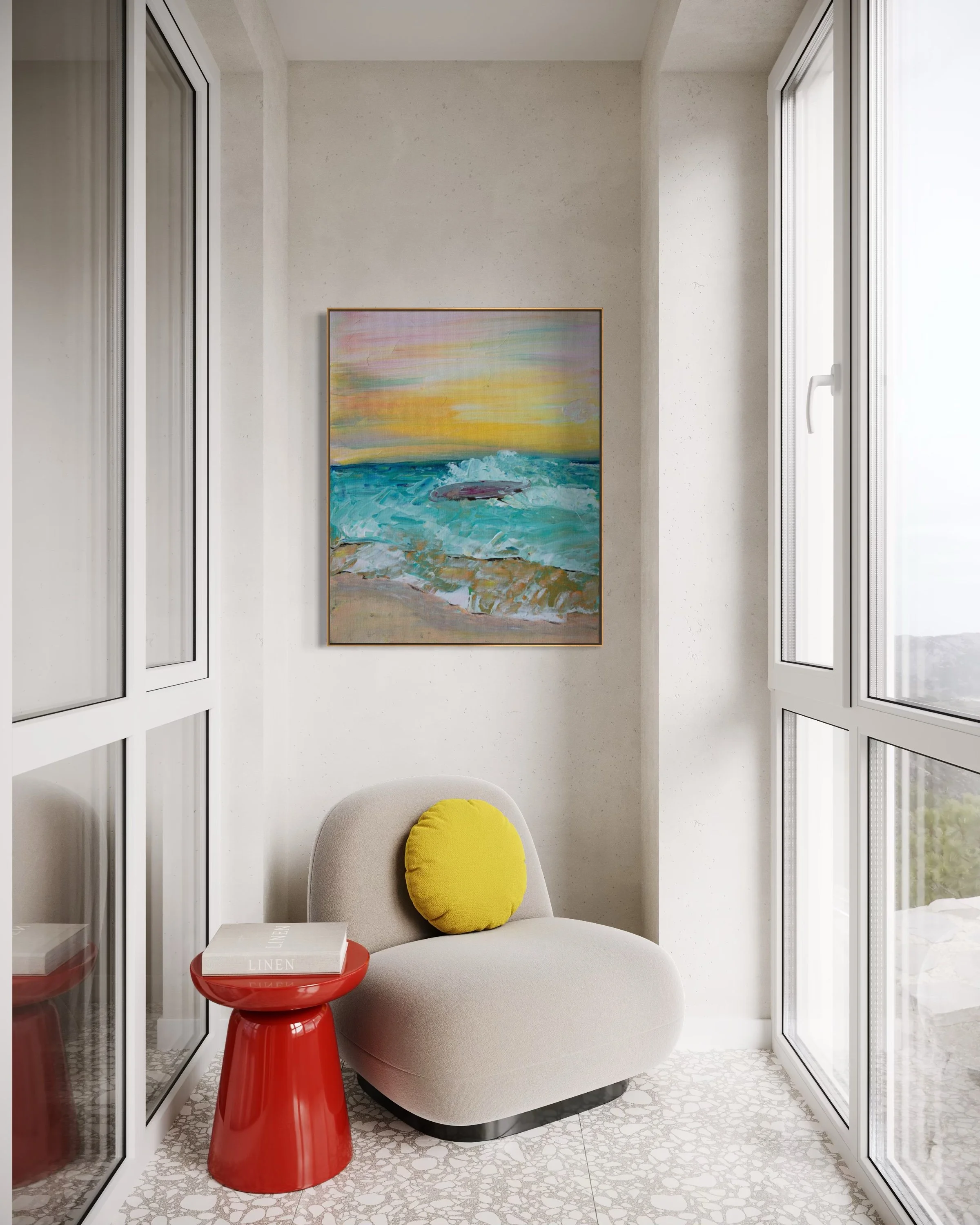 A cozy sitting area with a beige curved armchair, a round yellow pillow, a red side table with a book titled 'Linen,' and a colorful abstract landscape painting on the wall. The space is enclosed by white framed glass doors.