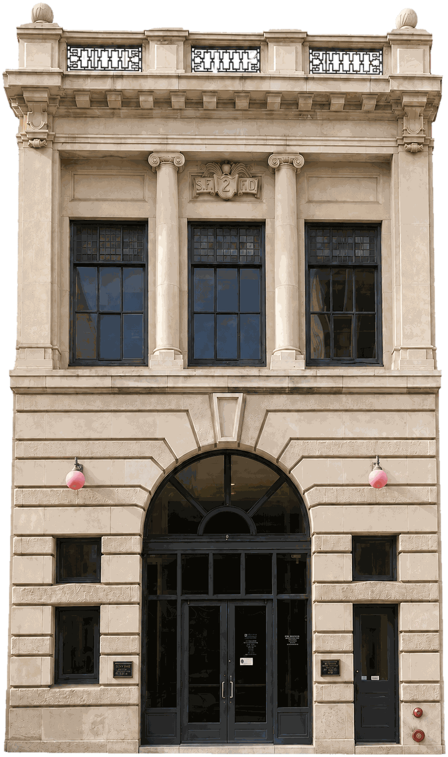 The Engine 2 firehouse, a two-story stone building with Ionic columns and an arched entrance