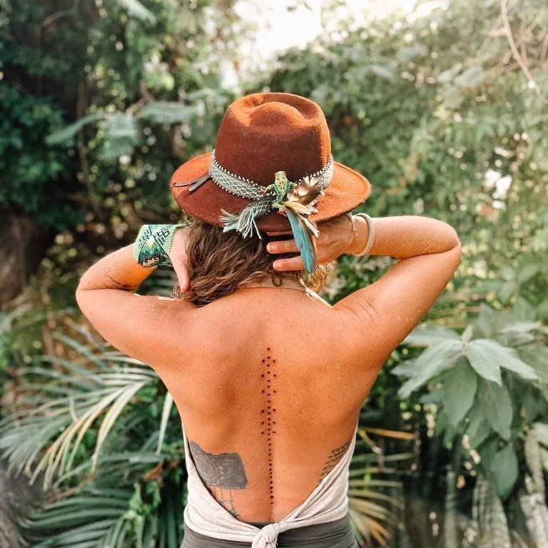 Elizabeth Anura from behind in the jungle