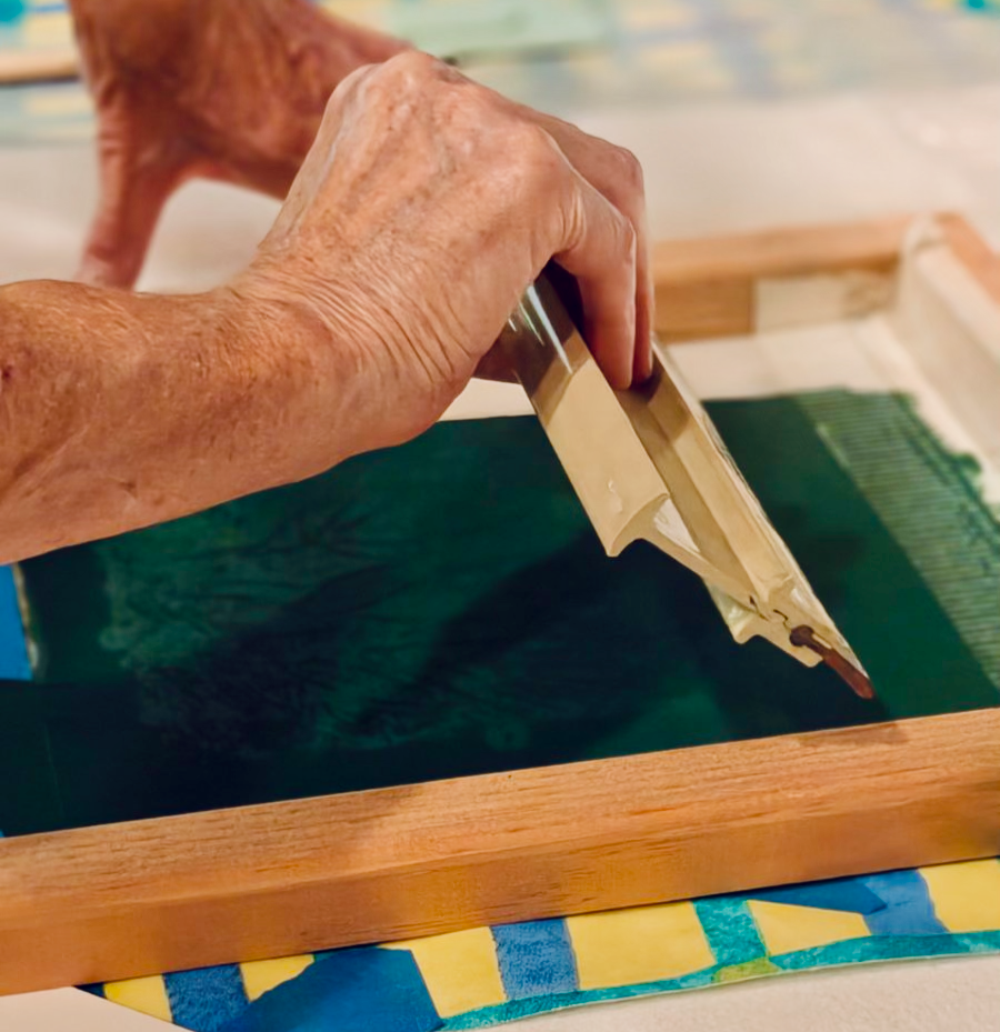 Image of artist screen printing from Handforth Botanical Studio